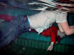 Pool swimming in jeans